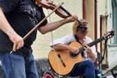 Jo and Dave busking in Brecon, September 2021