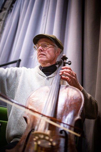 Ian Jones playing his cello. Photo by Tchad Blake