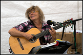 Jo with a happy smile, despite the rain, at Talgarth Festival, 24 August 2024
