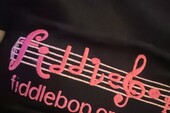 Reuben Beau Davies of <a href="https://hotvox.co.uk/artist/ghost-arcadia/" target="_blank" rel="noopener">Ghost Arcadia</a> models a FiddleBop tee shirt