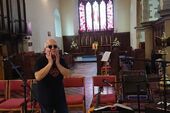 Dave looks worried. In St Mary's: FiddleBop at Brecon Jazz festival, August 2023