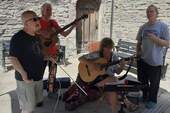 Jo, Dave, Graeme, and Paul busking in Brecon, July 2022. Where is Paul's keyboard? Photo: John Powell