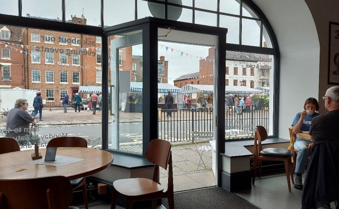 Inside Bill's Kitchen, looking out at Ludlow market